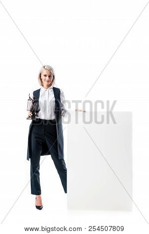 Smiling Lawyer With Temida In Hand Standing At Blank Banner Isolated On White