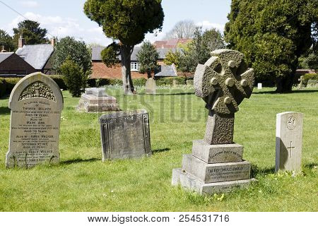 Winslow, Uk - April 27, 2015. Old Gravestones And Headstones In An English Graveyard In The Historic