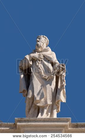 ROME, ITALY - SEPTEMBER 02:  St. John of Matha, fragment of colonnade of St. Peters Basilica. Papal Basilica of St. Peter in Vatican, Rome, Italy on September 02, 2016.