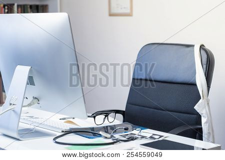 Modern Medical Doctor Office. Empty Working Place Of A Practicing Physician