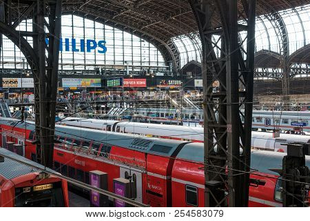 Hamburg, Germany - August, 2018: Trains And Passengers At Main Railway Station In Hamburg