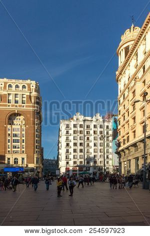 Madrid, Spain - January 23, 2018: Sunset View Of Walking People At Callao Square (plaza Del Callao) 