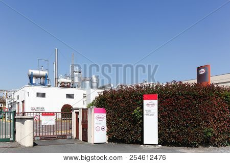 Arnas, France - June 30, 2018: Henkel Manufacturing Plant. Henkel Is A German Chemical And Consumer 