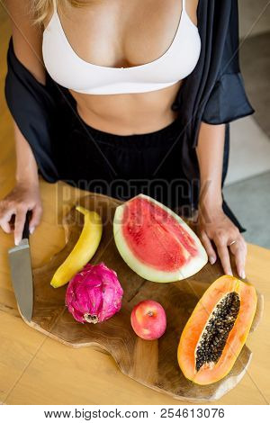 Sexy Lady With Tasty Fruits On A Kitchen. Papaya, Carica, Apple, Watermelon, Dragon Fruit. Healthy E
