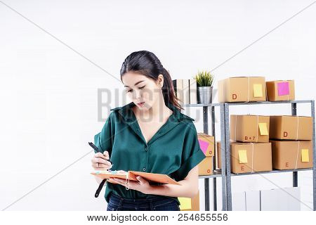 The Lady Is Record Order On Book, Working E-commerce,at Home Offece,post Box On Shelf Prepare For Sh