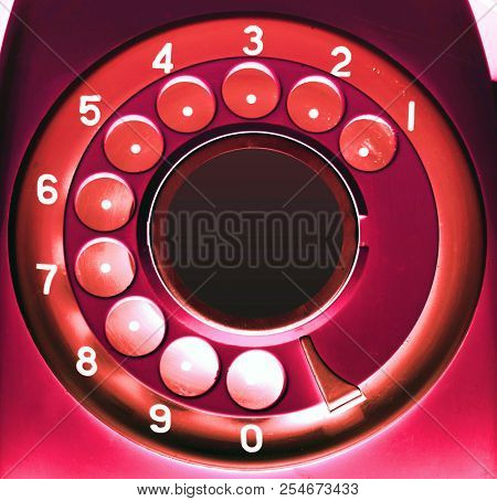  red retro phone  dail close up abstract 