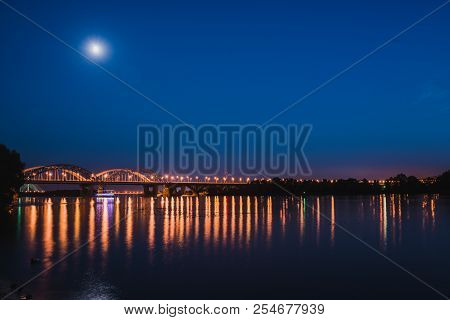 Darnitskiy Bridge Across Dnepr River At Night. Kiev, Ukraine