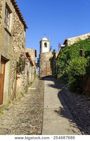 View Of The Cobble Street Leading To The Clock Tower In The Historic Village Of Castelo Rodrigo, Por