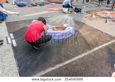 Redmond, Wa. /  Usa - August 19th 2018: An Artist Works At The Chalkfest Event In Redmond, Washingto