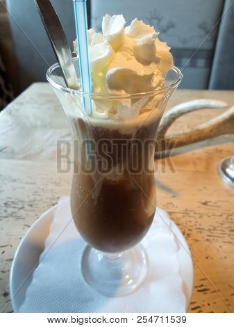 Tasty Ice Coffee In A Tall Glass
