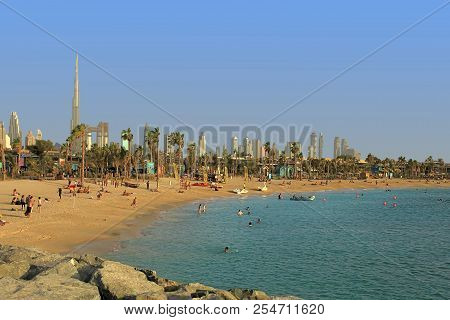 La Mer In Dubai, Uae - May 06, 2018: La Mer  At Sunset:  People Rest On The Beach.  It Is A New Beac
