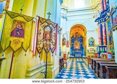 Krakow, Poland - June 11, 2018: Beautiful Banners With Embroidered Icons Located In St. Bernard Of S