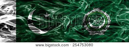 Pakistan Vs Arab League Smoke Flags Placed Side By Side. Thick Colored Silky Smoke Flags Of Pakistan