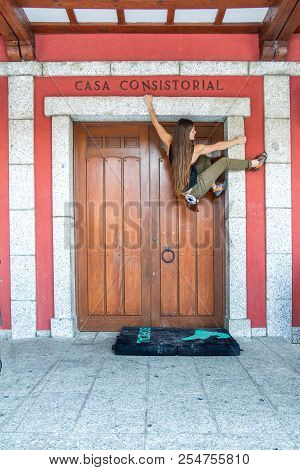 Cercedilla, Spain - 02 2015: Woman During A Urban Climbig Competition In The Town Hall