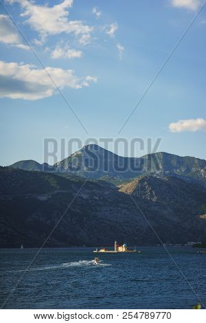 Boko-kotorska Bay In Montenegro. Epic View Of The Island Of Saint George Island And The Roman Cathol