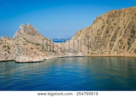 Jebha Island And Waves And Rocks