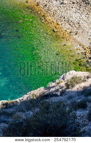 Jebha Island And Waves And Rocks