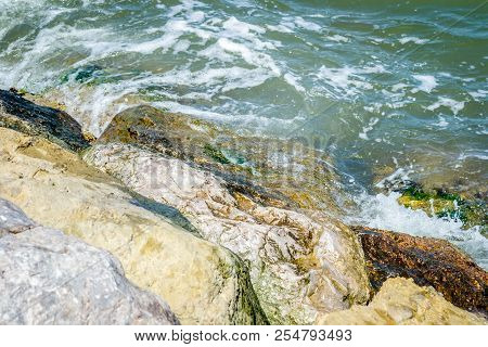 Jebha Island And Waves And Rocks