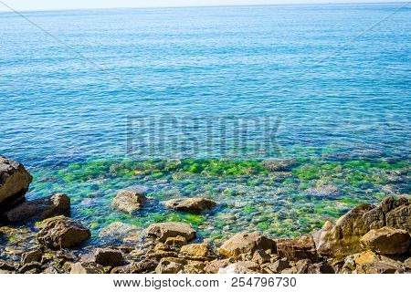 Jebha Island And Waves And Rocks