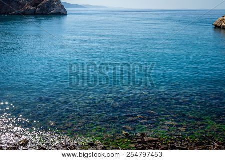 Jebha Island And Waves And Rocks
