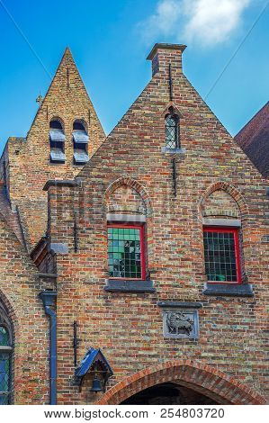 Bruges, Belgium - October 13, 2015: Architectural Facade Detail At Old Buildingas Placed In Bruges, 