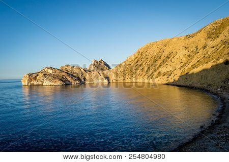 Jebha Island And Waves And Rocks