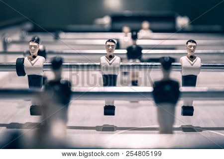Closeup Scene On Player Dolls In Attack Row Rod Ready Before Game Start Of Vintage Table Football Un