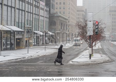Montreal, Ca - 21 November 2016: First Snowfall Of The Season Hits The City. Pedestrian On Mcgill Co