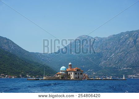 Boko-kotorska Bay In Montenegro. View Of The Island Of Saint George Island And The Roman Catholic Ch