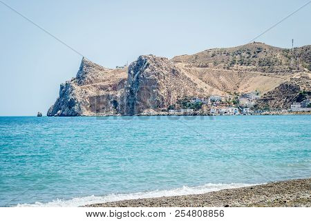 Jebha Island And Waves And Rocks