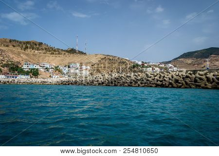 Jebha Island And Waves And Rocks