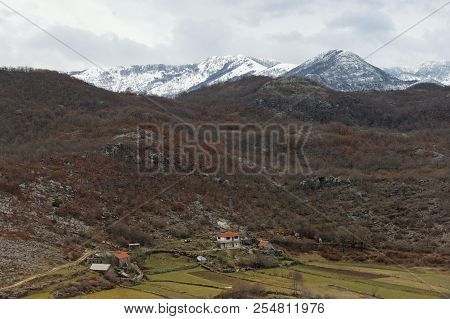 Mountain Landscape With Small Village On Cloudy Winter Day. Montenegro, Dinaric Alps, Sitnica Region