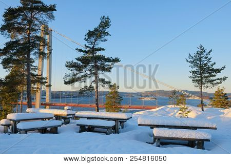 View At Hoga Kusten Bridge In Winter In Sweden. Hoga Kusten Suspension Bridge In Sweden. Tourist Ben
