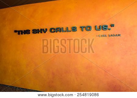 Cape Canaveral, Florida - August 13, 2018: Quote The Sky Calls To Us By Carl Sagan At Nasa Kennedy S