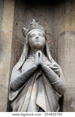 PARIS, FRANCE - JANUARY 11: Saint Radegund statue on the portal of the Saint Germain l'Auxerrois church in Paris, France on January 11, 2018.