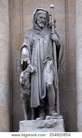 PARIS, FRANCE - JANUARY 11: Saint Roch, statue on the portal of Saint Roch church in Paris, France on January 11, 2018.