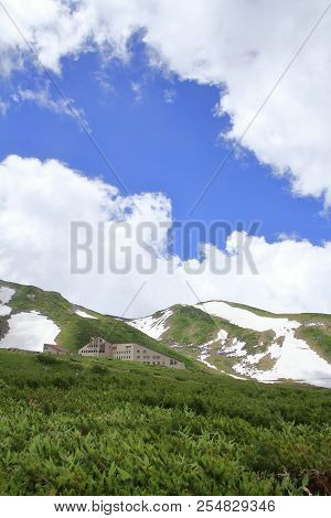 Tateyama Mountain Range With Snow In Summer In Toyama, Japan