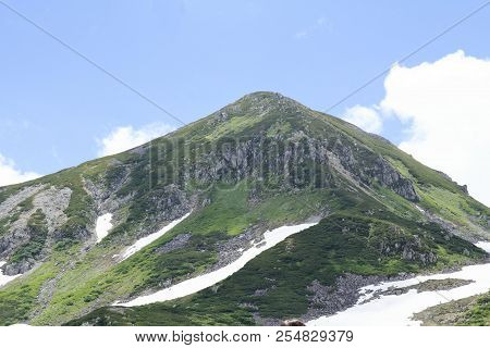 Tateyama Mountain Range With Snow In Summer In Toyama, Japan