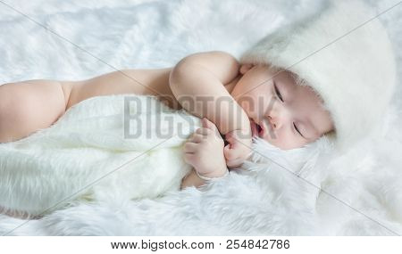 Newborn 30 Day Old Baby Boy Sleep On  A White Wrap Cloth Feelgood Relaxing Isolated On White Backgro