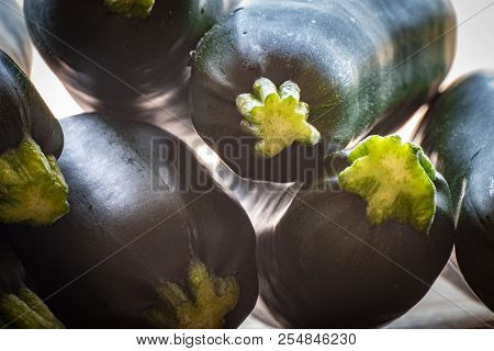 Close Up On A Fresh Crop Of Raw Green Zucchini Vegetables, Summer Squash.