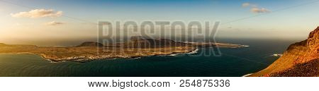Panorama Of La Graciosa Island Off The Lanzarote Coast With Oceanview Sunset And Blue Sky