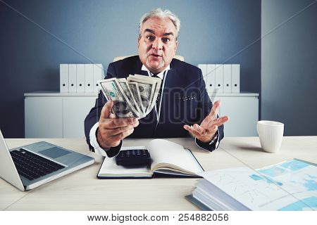 Mature Businessman Unhappy With Ammount On Money He Earned