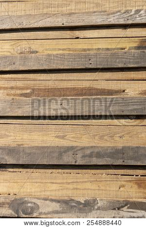 A Close Up Of Woodern Slates On Top Of Each Other