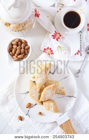 Italian Cookie: Almonds Canistrelli And Cup Of Coffee. Focus Selective, Top View