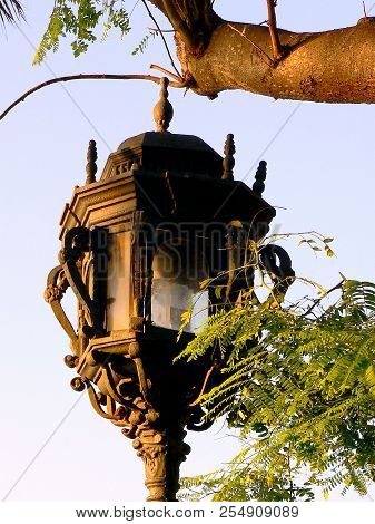 Lamppost Of Light In The Gardens Of Alameda Apodaca In Capital Of Cádiz, Andalusia. Spain. Europe.