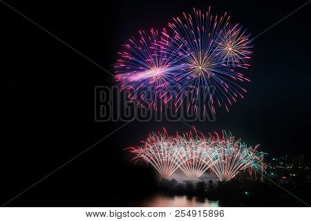 Colourful Fireworks Against Night Sky In Montreal Canada