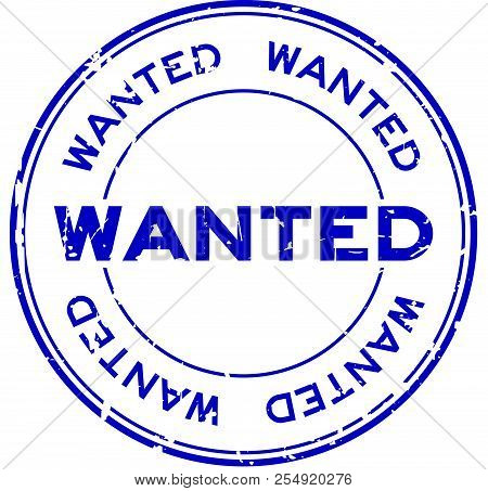 Grunge Blue Wanted Round Rubber Seal Stamp On White Background