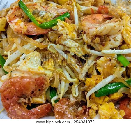 Top View Of Traditional Noodles Thai Style Pad Thai Or Phad Thai With Fresh Shrimp On Dish