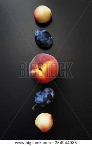 Fresh Ripe Juice Sweet Fruit On A Black Background