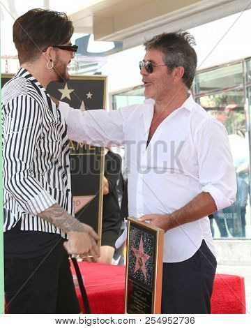 LOS ANGELES - AUG 22:  Adam Lambert, Simon Cowell at the Simon Cowell Star Ceremony on the Hollywood Walk of Fame on August 22, 2018 in Los Angeles, CA